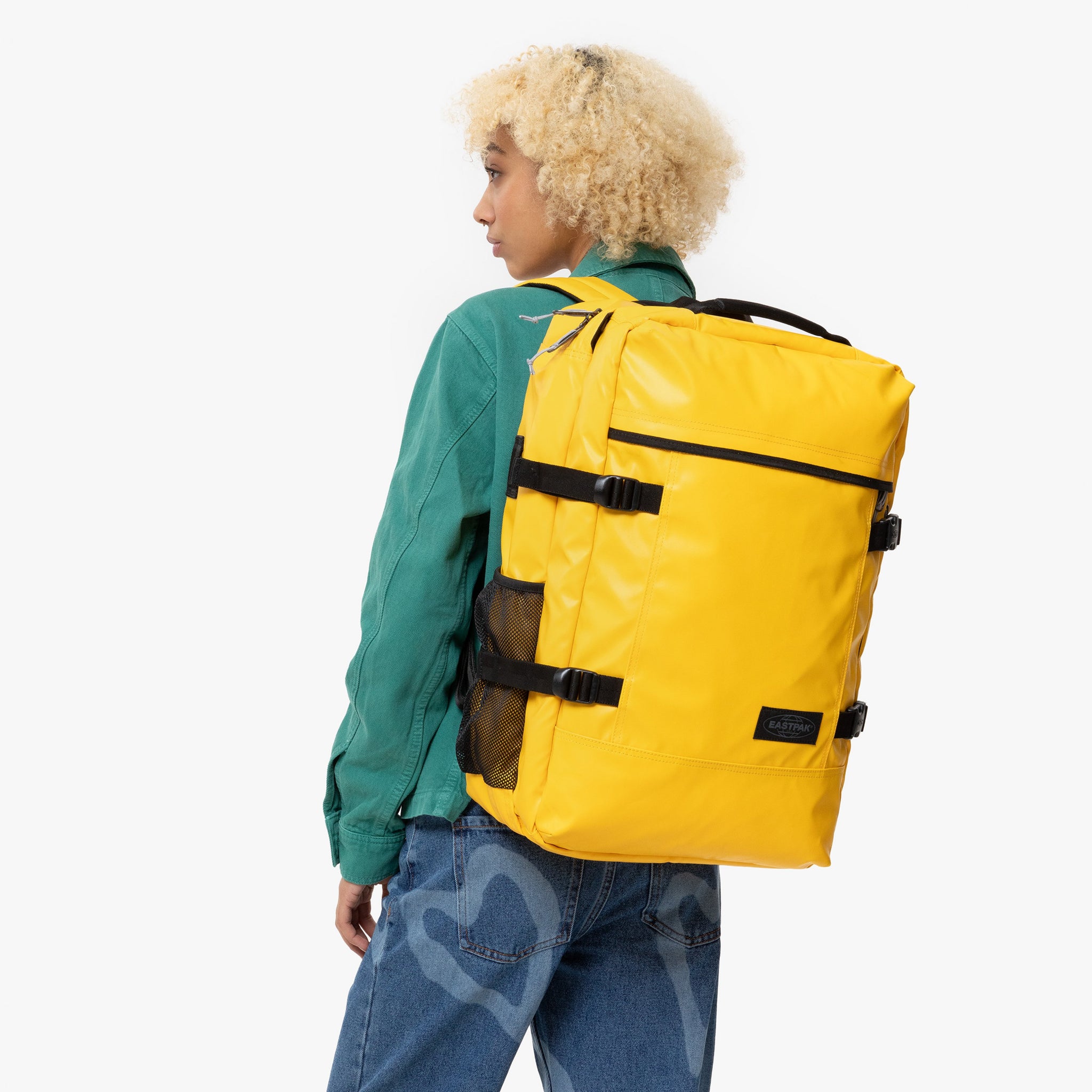 Eastpak Travelpack Tarp Yolk Large backpack with laptop sleeve