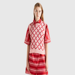 Reversible vest with wavy motif