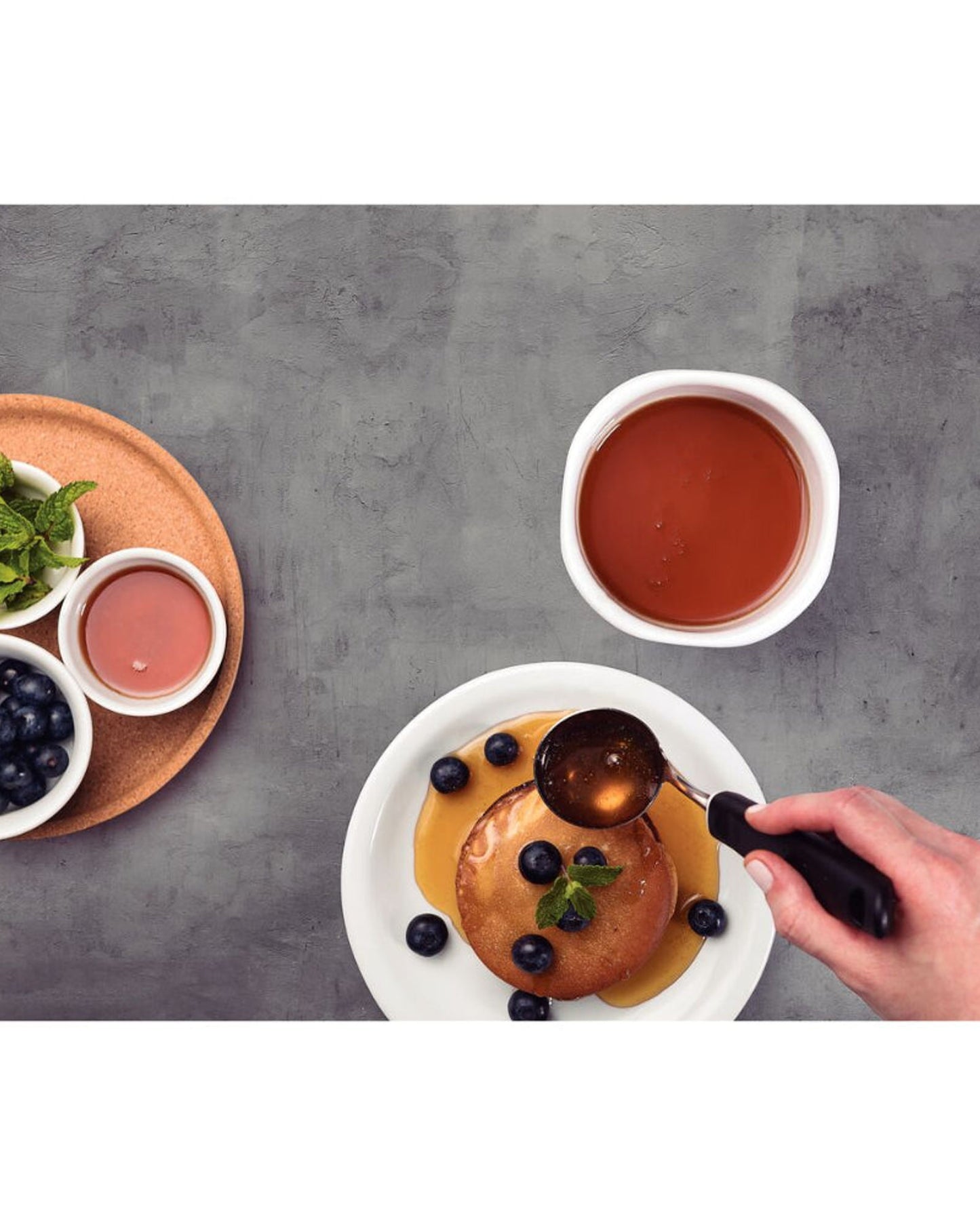 Tramontina Utilitá Stainless-Steel Sauce Ladle with Black Polypropylene Handle