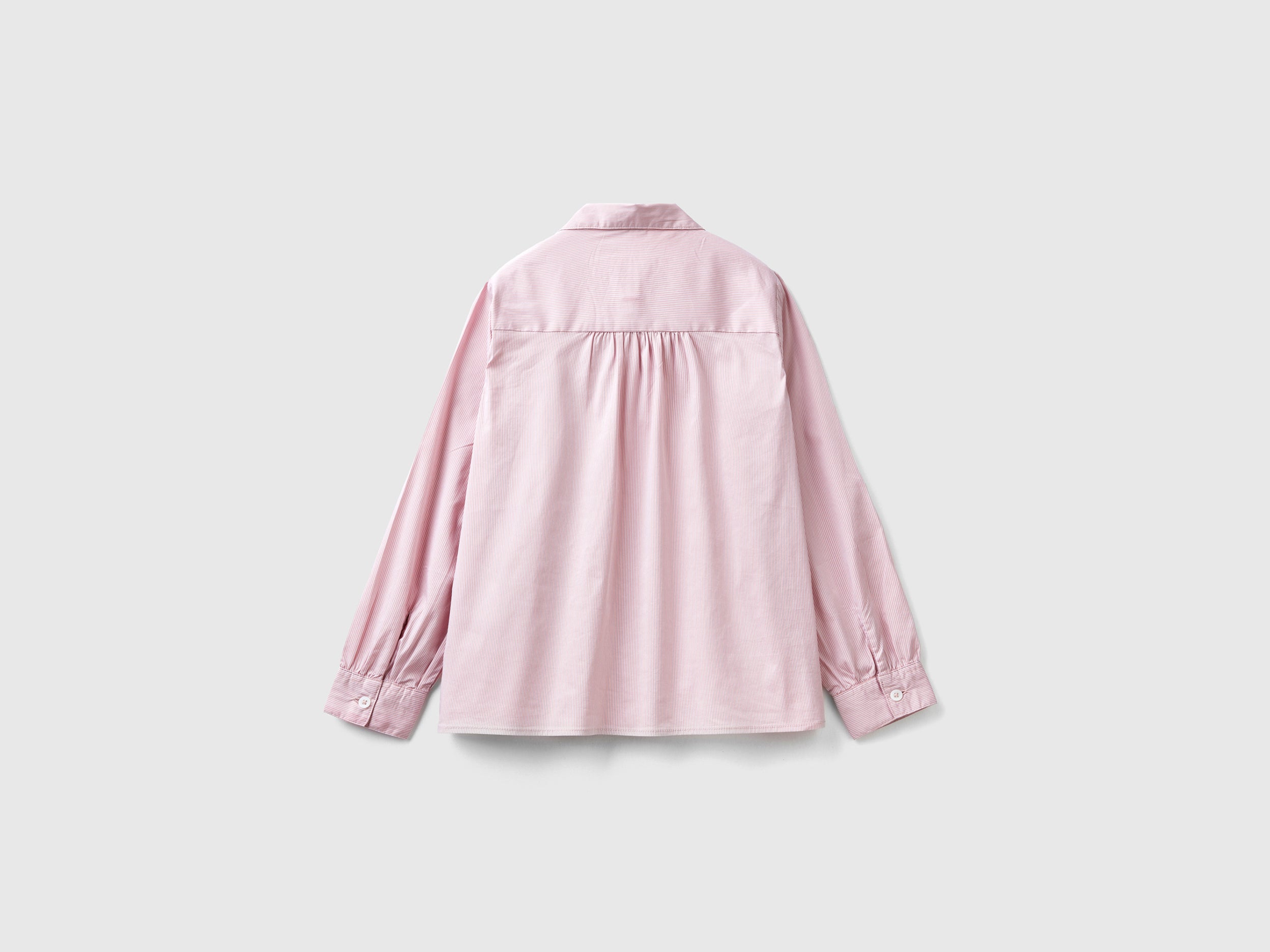 Shirt with rouches on the yoke