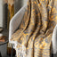 Togas Ethel throw in Orange Dark Grey